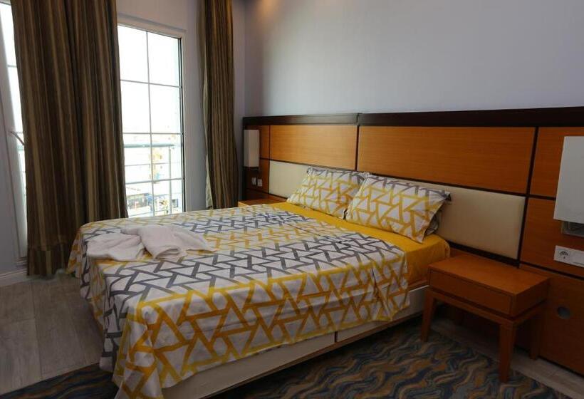 Номер Стандарт, Kommageneiz