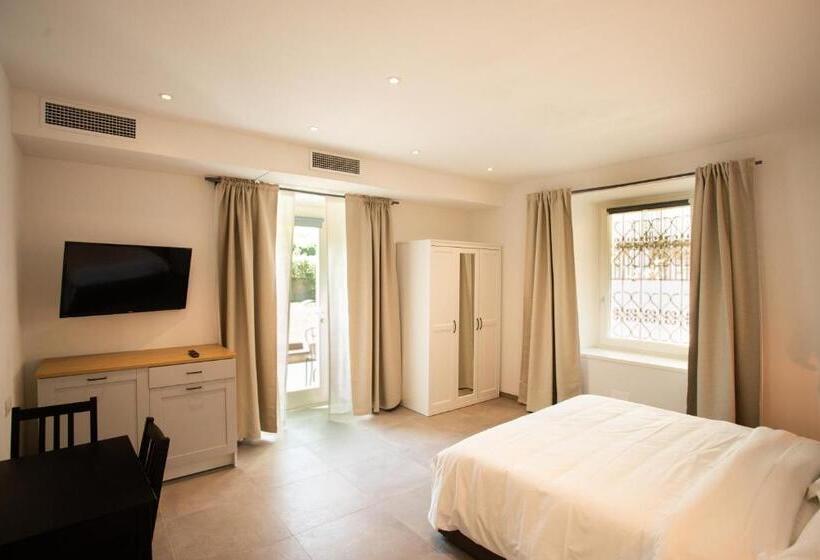 اتاق استاندارد با چشم‌انداز باغ, Alpencity Suites