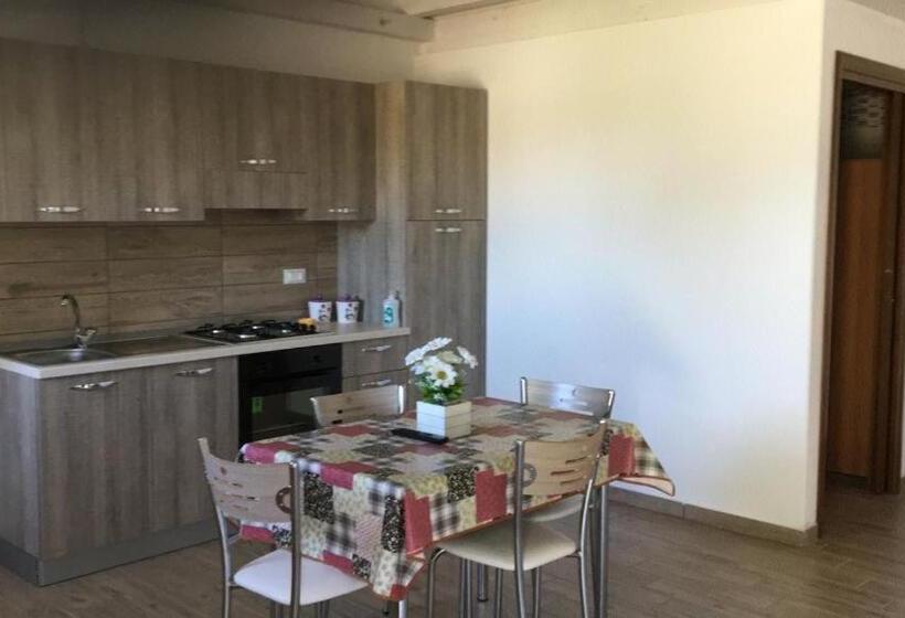 Апартаменты 1 Спальня Вид на Сад, Residence Le Tamerici