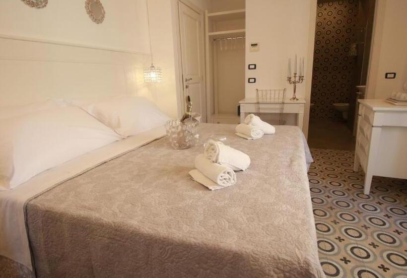 キングサイズベッドのデラックスルーム, Bellavita Accomodation