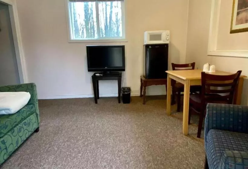 キングサイズベッドのスイートルーム, Country Place Inn And Suites