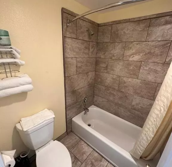 キングサイドベッドのスタンダードワンルーム, Relax Inn Of Medford