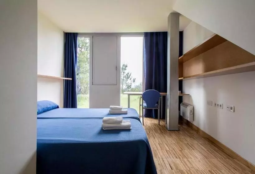 ルームシェアのワンベッド, Residencia Universitaria O Castro