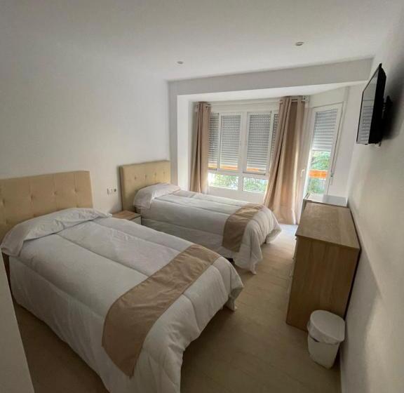 اتاق استاندارد با سرویس بهداشتی مشترک, Pensión Portugal