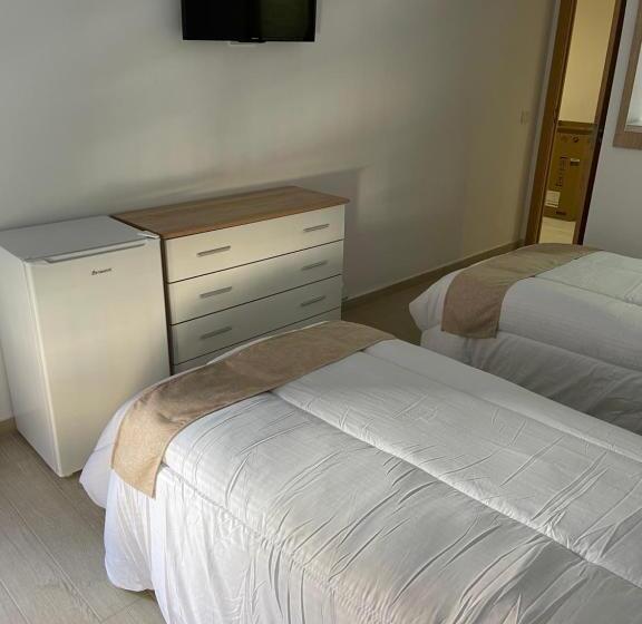 اتاق استاندارد با سرویس بهداشتی مشترک, Pensión Portugal