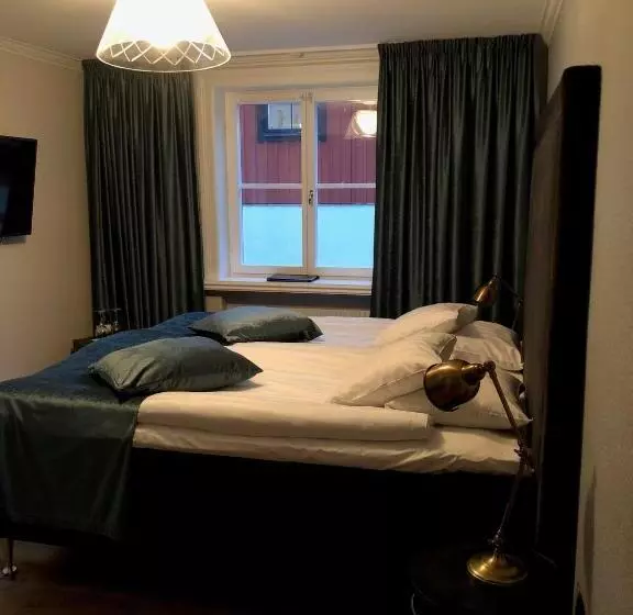 キングサイズベッドのスタンダードルーム, Donners Hotell