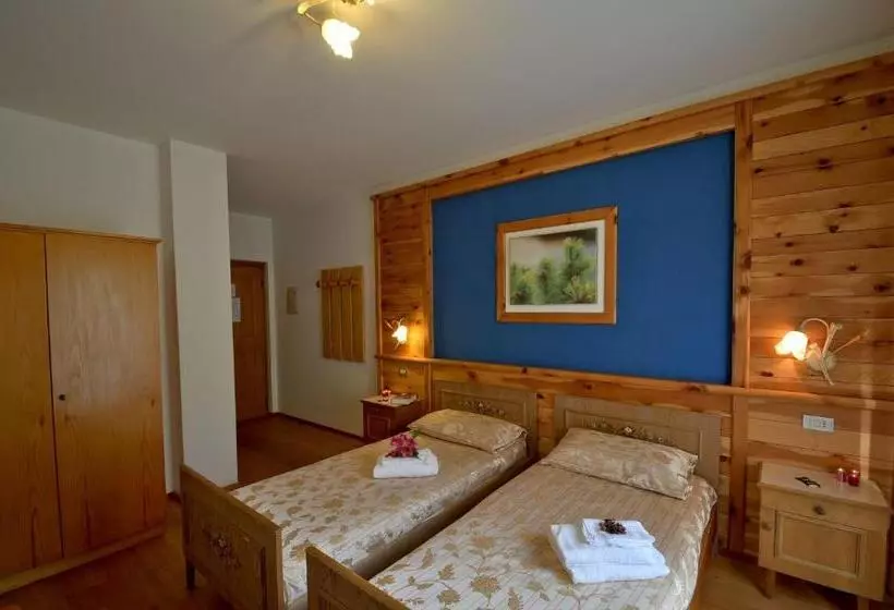 Perhehuone, Garni Edy