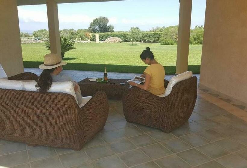 חדר סטנדרט לשלושה עם נוף לגינה, Agriturismo Sa Ruda