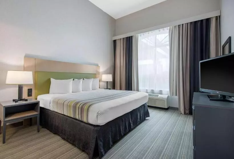 キングサイズベッドのスイートルーム, Country Inn & Suites By Radisson, Port Canaveral, Fl