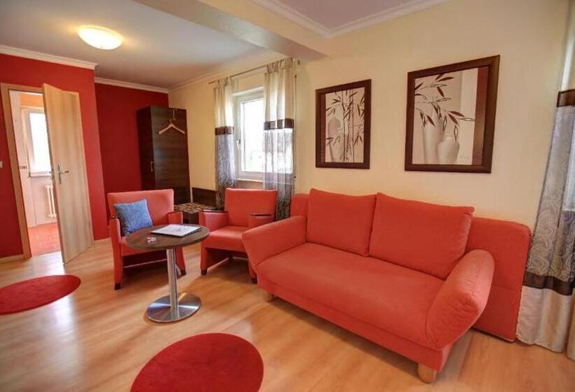 غرفة عائلية, Ricci