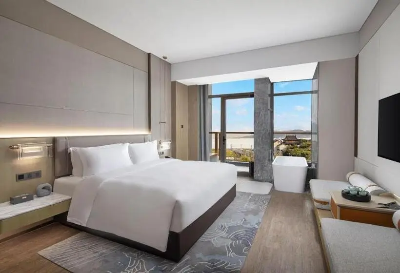 キングサイズベッドのデラックスルーム, Wonderland Hotel Ningbo International Conference Center