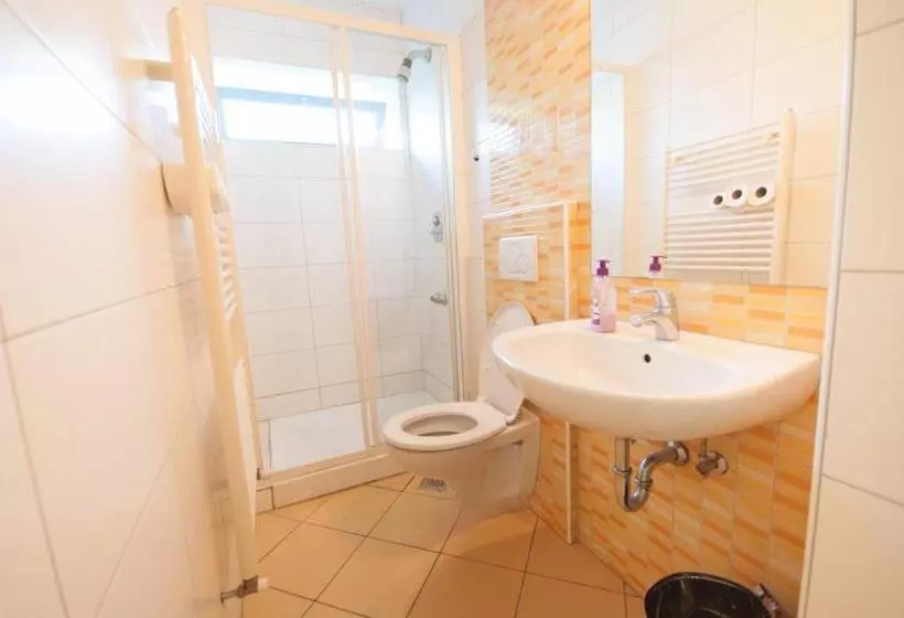 Bed in Shared Room with Shared Bathroom, Simbol Rooms With Free Private Parking
