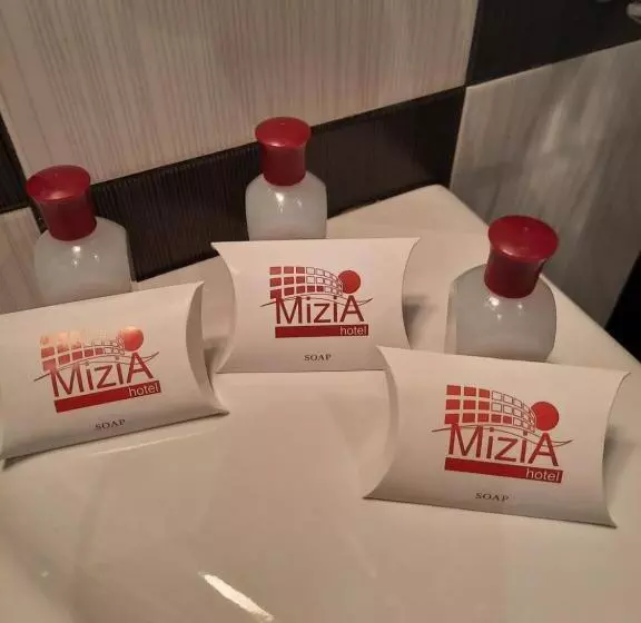 Juniorsviitti, Mizia