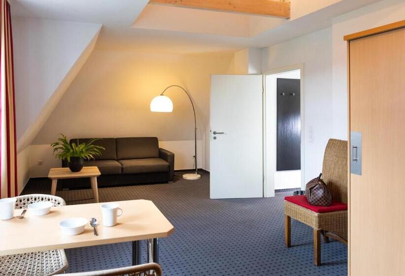 Номер Стандарт, Tiemanns Boardinghouse