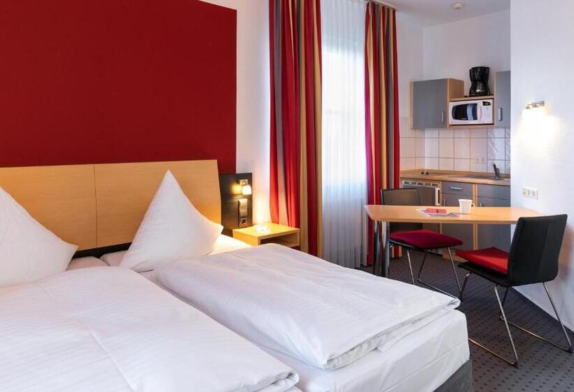 Номер Стандарт, Tiemanns Boardinghouse