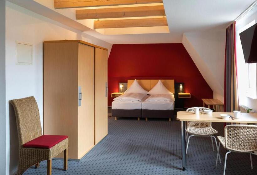 Номер Стандарт, Tiemanns Boardinghouse