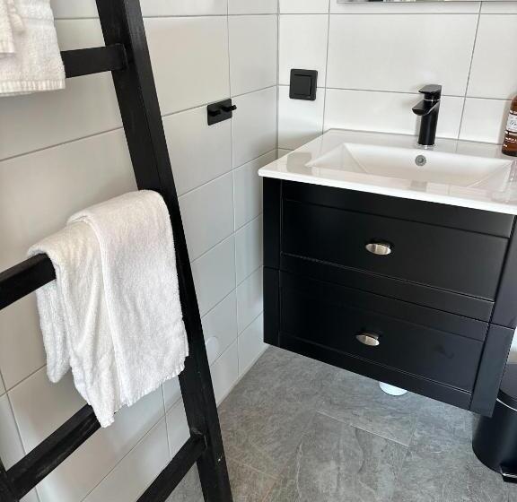 جناح جونيور مزوَّد بشرفة, L Käringön