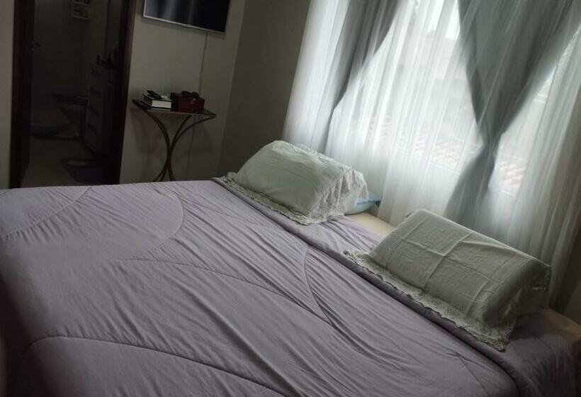 스위트, Pousada Rara House