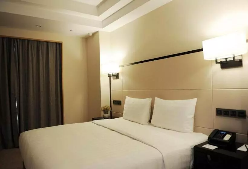 Superior-huone King-vuode, Pullman Qingdao Ziyue