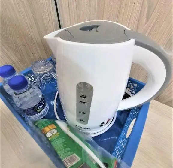庭の見えるスタンダードトリプルルーム, Hasina Resort@sedili