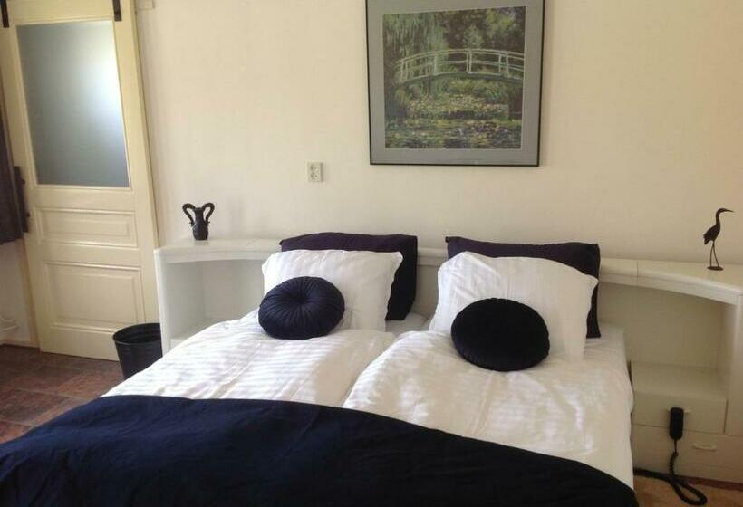 キングサイズベッドのデラックスルーム, B&b De Handwijzer Hengelo