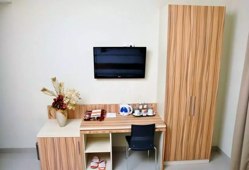 Deluxe Zimmer, Rangkayo Basa Halal