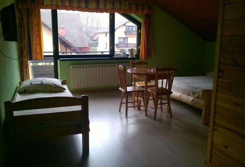 Quarto Triplo Estandar, Na Brzegu