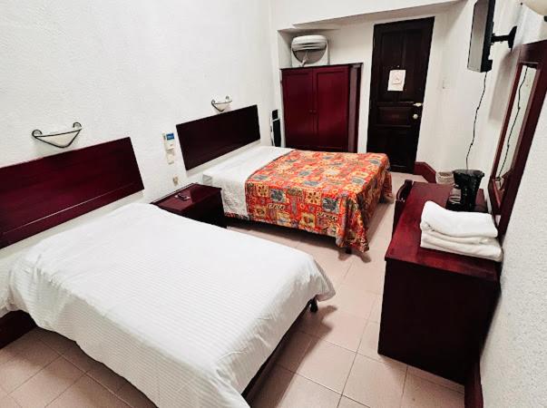 اتاق اکونومی, Nueva Antequera