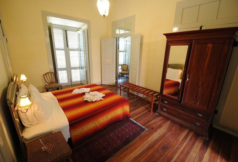 اتاق خانوادگی, The Colonial Guest House