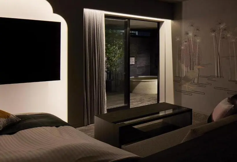 キングサイズベッドのデラックススイート, Yatomi Hotel Nuqu Natural Hot Spring