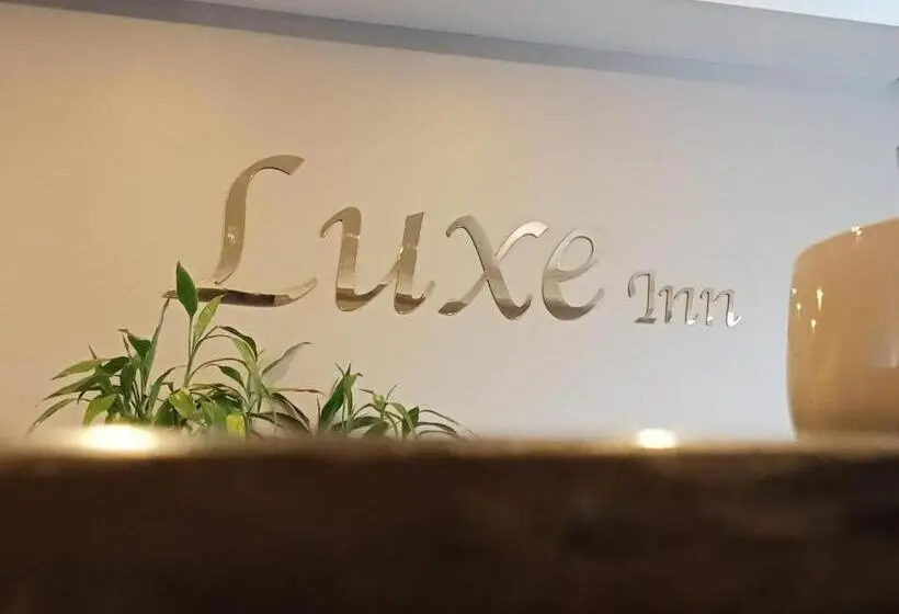 Chambre Economy, Luxe Inn