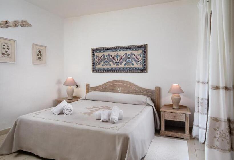 Апартаменты Deluxe 1 Спальня, Punta Falcone Resort