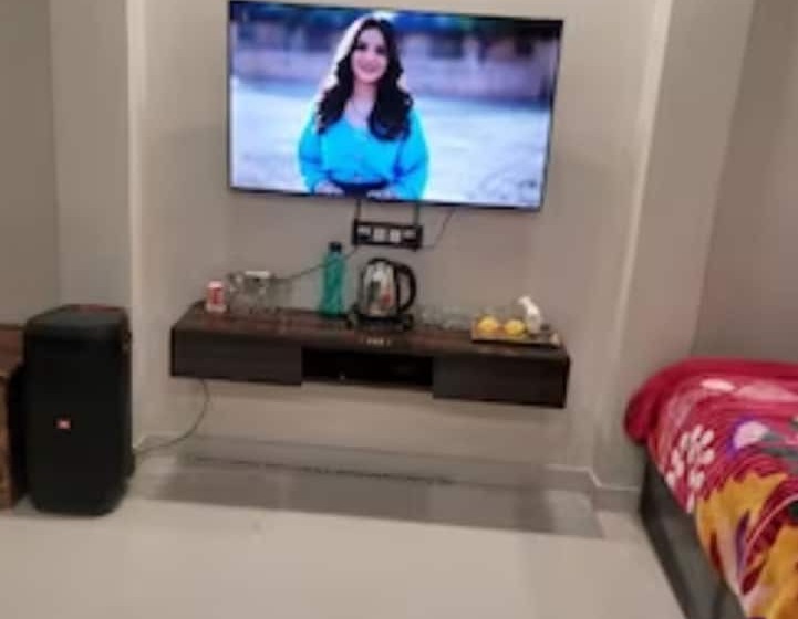 Quarto Deluxe, Goroomgo Kashi Paradise Varanasi