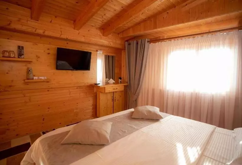 Quarto standart com varanda, Shpija E Gjyshit