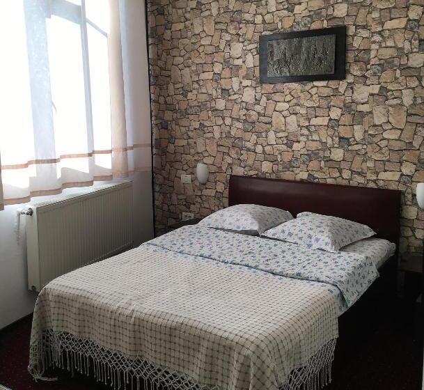 Standard Enkelrum, Taco