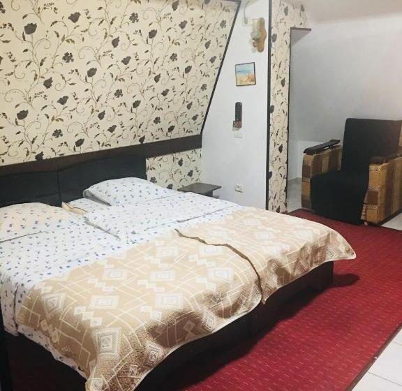 Standard Trippelrum, Taco