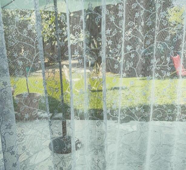 غرفة عائلية مطلّة علي الحديقة, La Valle Incantata