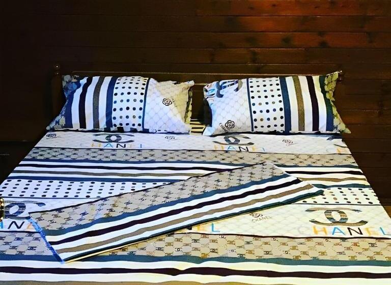 חדר משפחתי נוף לגינה, Guesthouses Gjokazaj Tale Beachfront