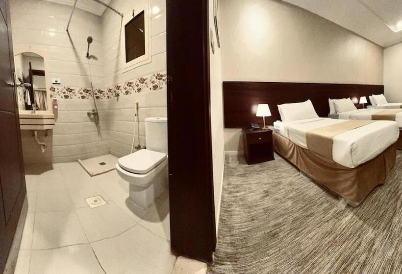 3 Bett Deluxe Zimmer, فندق الضيافة الذهبية