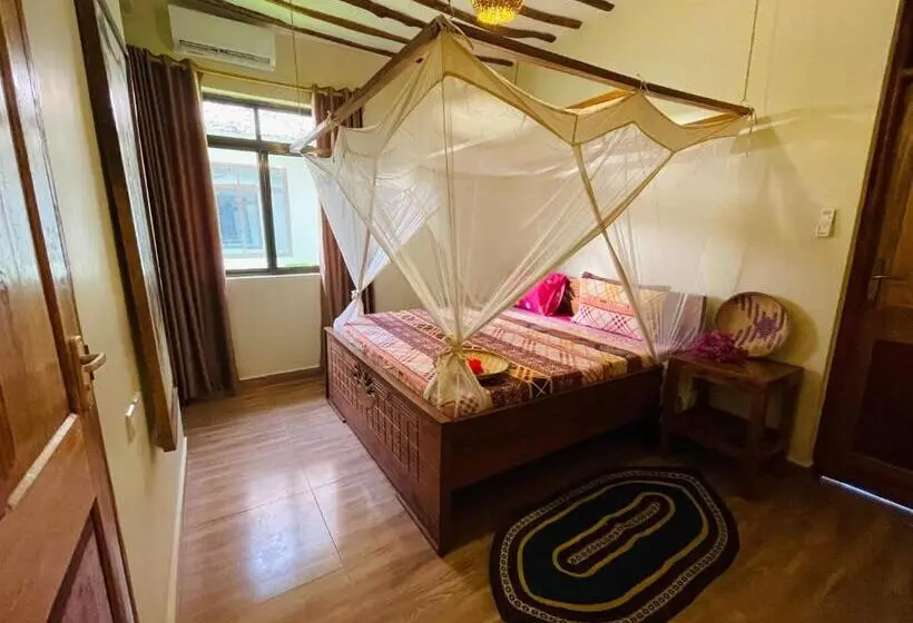 Huoneisto 1 Makuuhuone Allasnäkymä, Lulu Bungalows