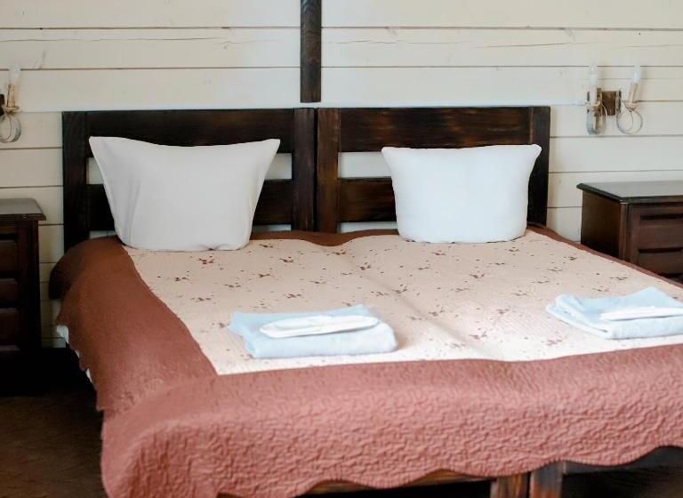 غرفة قياسية, Orlyne Gnizdo