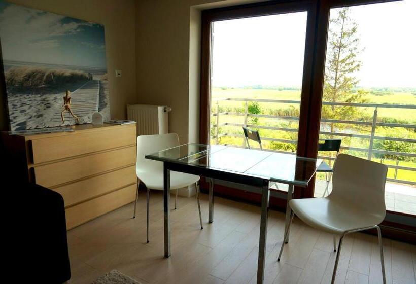 Suite with lake view, Villa Modlin Airport