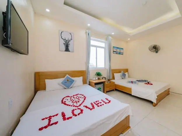 اتاق سه نفره دلوکس با چشم‌انداز دریا, Lang Chai Seaside Charm Hotel Cat Ba