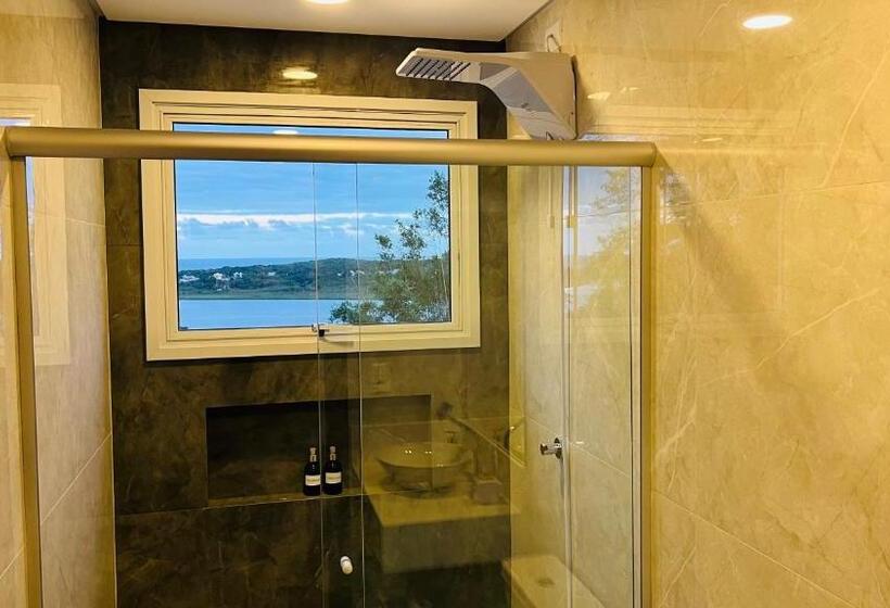 Quarto Deluxe Vista Mar com Sacada, Suítes Costa Do Macacu Garopaba