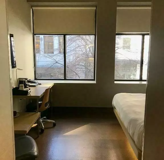 キングサイズベッドのスタンダードルーム, Cityflatshotel   Grand Rapids, Ascend Hotel Collection