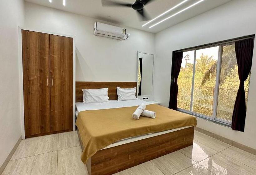 غرفة ديلوكس مزودة بشرفة, Iris Villa   Nagaon Beach