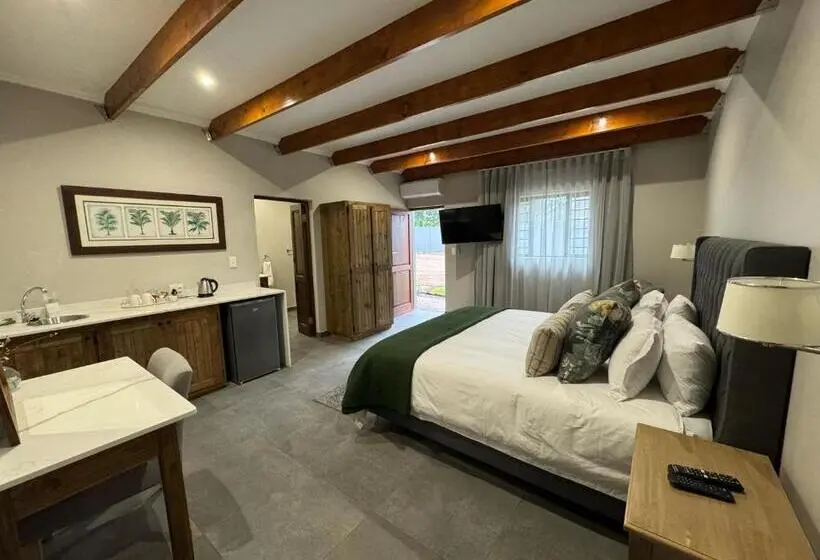 キングサイズベッドのスタンダードルーム, De Akker Guest House Louis Trichardt