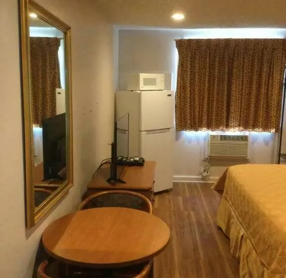 キングサイズベッドのスタンダードルーム, Americas Express Inn Rocky Mount