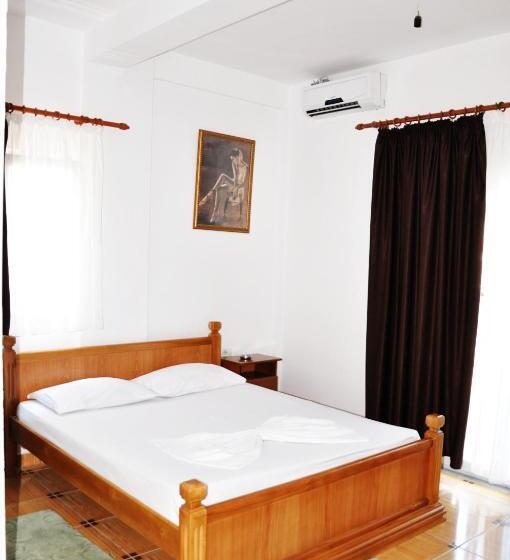 Quarto standart com varanda, Floga