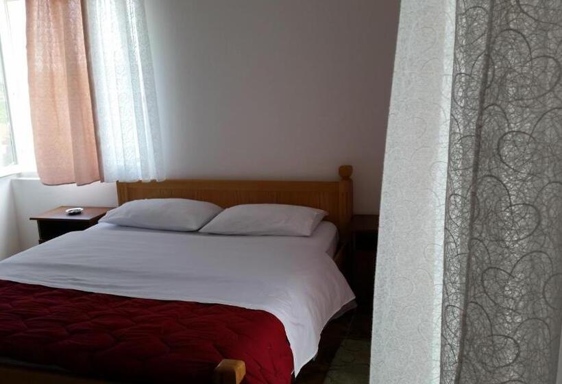 Quarto standart com varanda, Floga